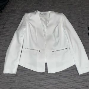 Woman’s white blazer